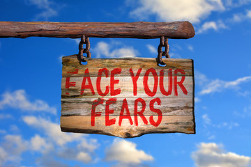 Face your fears motivational phrase sign