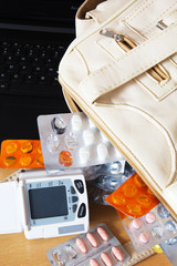 Fototapeta na wymiar Medicines in Handbag