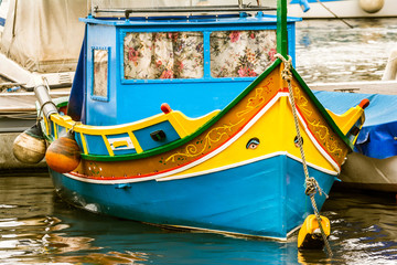 Fototapeta na wymiar Luzzu boat, Marsaxlokk harbor, Malta