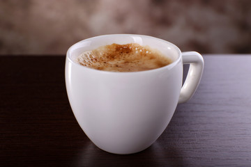 Cup of coffee on table close up