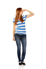 Obraz premium Teenage woman holding her nose because of a bad smell