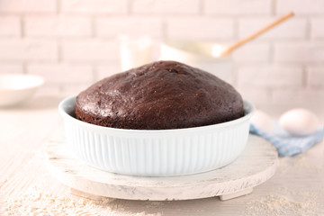 Cooked chocolate pie in a baking tray on a table