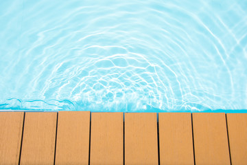 Swimming pool and wooden deck for backgrounds