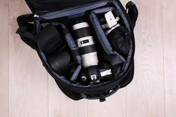 Naklejka premium Photographer's equipment on the floor in a room