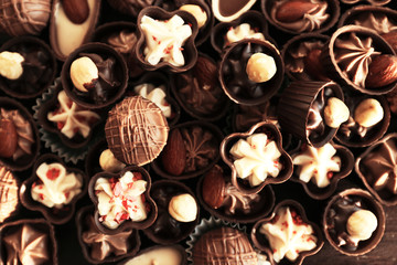 Delicious chocolate candies background, close up