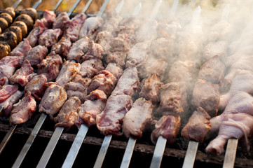 beef and pork steak bbq on the grill