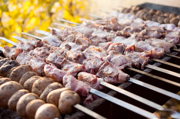 beef and pork steak bbq on the grill
