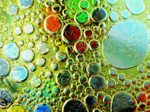 Olive Oil Bubbles In Water Close Up