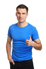 Handsome man in blue shirt showing thumb up