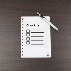 Lined paper notebook with checklist and pencil. Lines with check boxes. Plan Concept