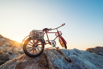 retro toy bicycle by the sea
