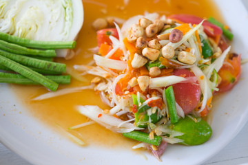 Green papaya salad Thai cuisine spicy delicious - SOM TAM - Thai