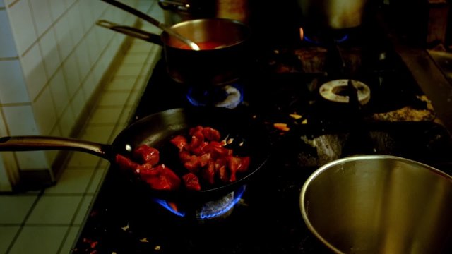 cooking meat in pan