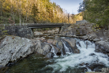 Bridge Over a Cascading Stream in Autumn - Tennessee