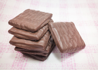 Stack of milk chocolate pieces