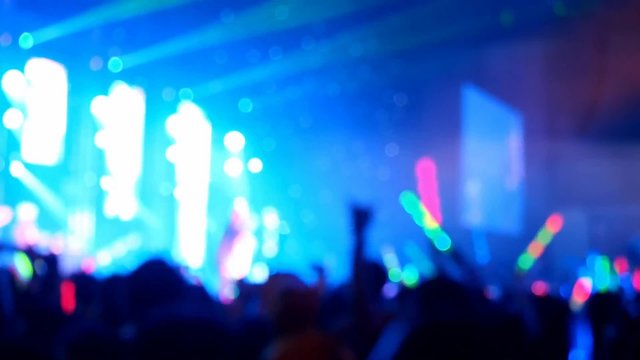 blurred focused concert crowd in hall