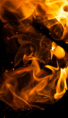 fire flames with sparks on a black background