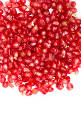 pomegranate seeds on a white background