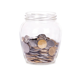 Coins in glass money jar