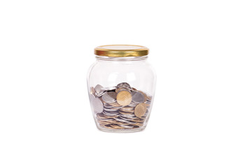 Coins in glass money jar