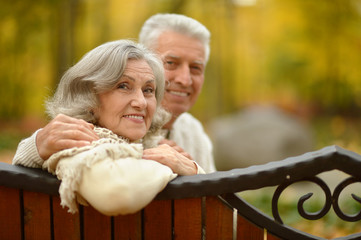 Senior couple in autumn park