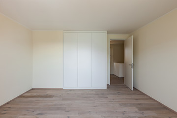 Interior, empty room with closet