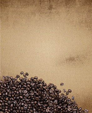 coffee beans on paper texture, vintage background 
