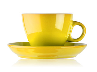 Yellow cup and saucer