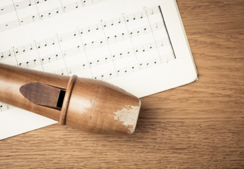 Wooden recorder and notes in close up © larshallstrom