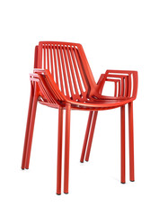 Stacked Red Metal Chairs on White Background, Three Quarter View