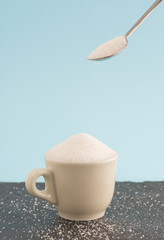 Cup filled with sugar