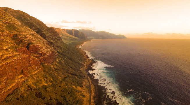 Sunset aerial view of beautiful Kaena coast on the north west of Oahu, Hawaii at sunset.