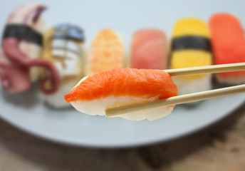 sushi with chopsticks
