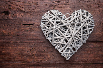 Large heart on a wooden background