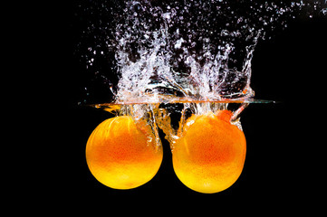 water splash with fresh orange