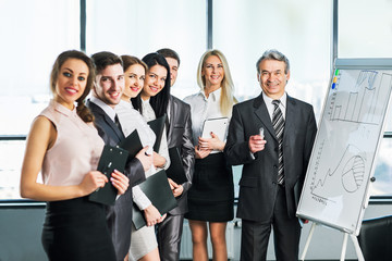 Obraz premium A group of businessmen discussing the policy of the company 