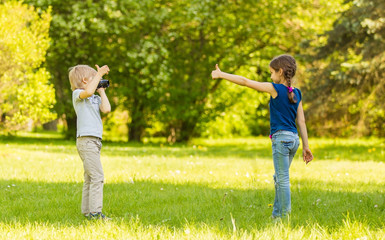 brother and sister are photographed in summer Park