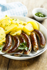 Fried sausages with potato salad