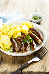 Fried sausages with potato salad