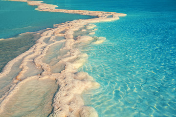 Fototapeta na wymiar Texture of Dead sea. Salt sea shore