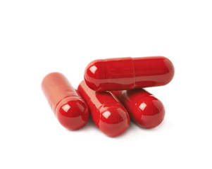 Pile of red pills isolated