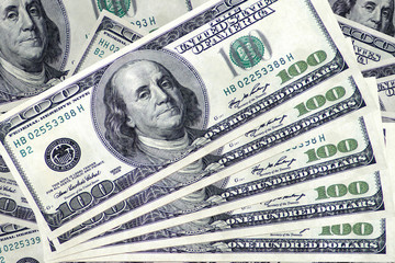 Pile of one hundred dollars design as background .
