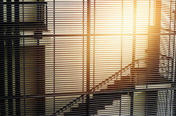 modern interior with stair and lath wall