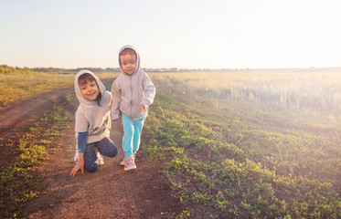 Boy and girl playing outdoors