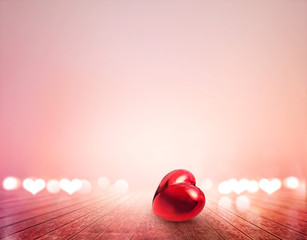 red heart and bokeh on wooden floor vibrant for background, soft and blur