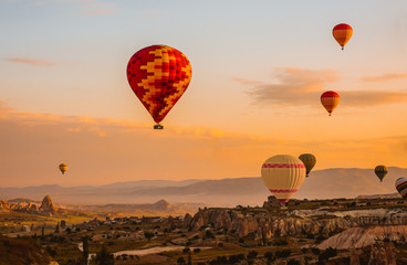 Hot air balloons fly over Cappadocia