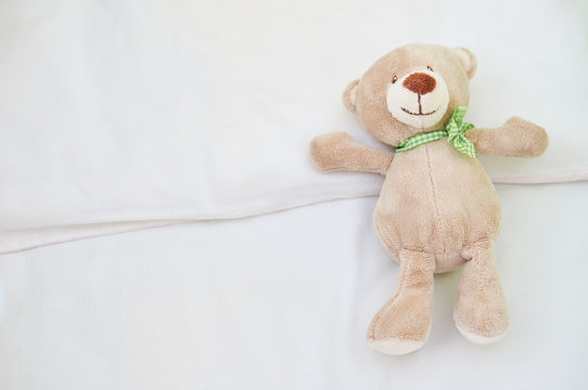 Cute teddy bear on kids bedroom.
