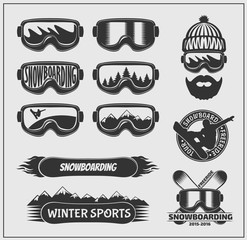 Collection of snowboarding labels, emblems, badges and design elements.