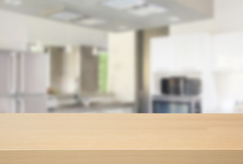 Empty wooden table and blurred kitchen background, product display