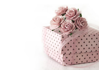 Pink gift box on white background